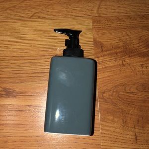 New grey ceramic soap dispenser
